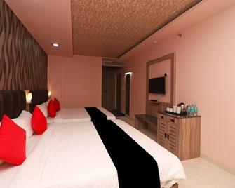 首都 O 27765 Vip 广场酒店 - 普里 - 睡房
