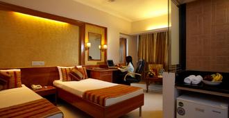 孟买阿维翁酒店 - 孟买 - 睡房