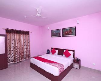 Corbett Sunrise Resort - 拉姆讷格尔 - 睡房