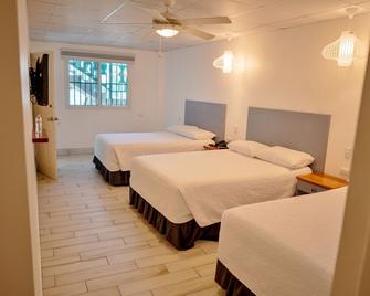 Green World Hotel - 弗洛雷斯(弗洛里斯) - 睡房