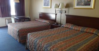 国家 9 旅馆花园城市酒店 - 加登城(堪萨斯州) - 睡房