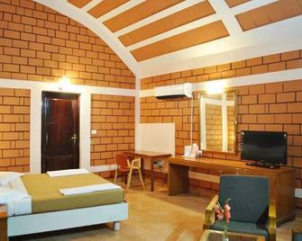 Grand Maurya Resort - 迈索尔 - 睡房