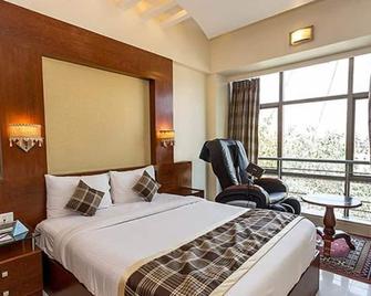 Fabhotel Poco Loco - 孟买 - 睡房