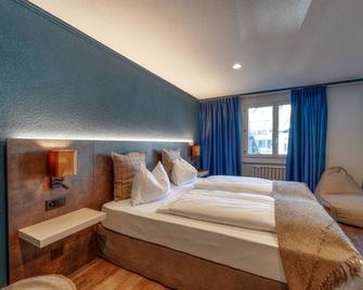 瑞士高地城市优质酒店 - 因特拉肯 - 睡房