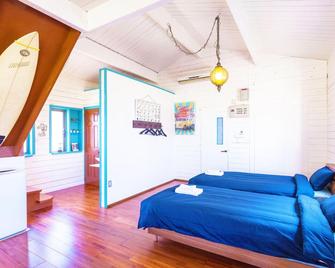 Kariyushi Condminium Motobu Churaumi Beach House - 本部 - 睡房