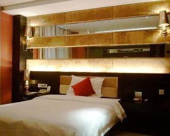 Wuhu Nanyuan e Family Hotel - Fangte - 芜湖 - 睡房