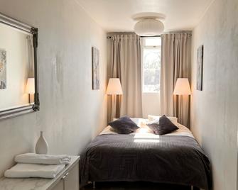 Casa Dísa - Apartments A Boutique Guesthouse in Reykjavik City`s Central Park and Botanical Garden in Laugardalur, Hot-Spring-Valley - 雷克雅未克 - 睡房