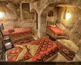 世纪洞穴酒店 - 格雷梅 - 睡房