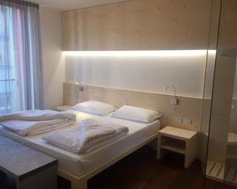 Komodo short stay apartments - 特伦托 - 睡房