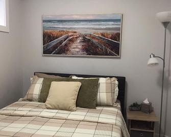 Cozy 1bed suite in Stonebridge. 5-star location - 萨斯卡通 - 睡房