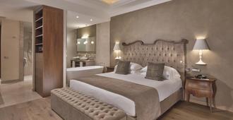 法萨诺大酒店 - 加尔多内-里维耶拉 - 睡房