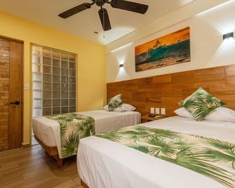 巴里萨斯德尔马公寓 - Santa Cruz Huatulco - 睡房