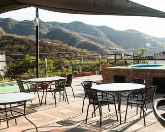 奇古克斯达酒店 - Taganga - 阳台