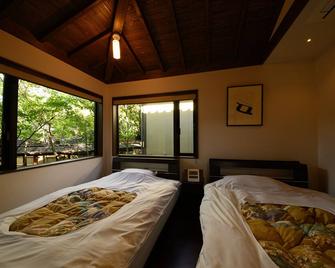 由布院溫泉萌莊日式旅館 - 由布市 - 睡房