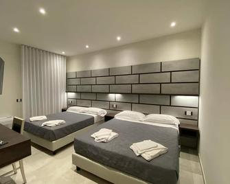 B&B Bertani - 摩德纳 - 睡房