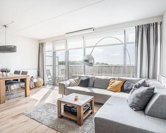 Modern appartement met gratis fietsen - 布雷达 - 客厅