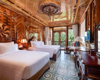 考可帕慕比奇Spa度假村 - Phu Quoc - 睡房