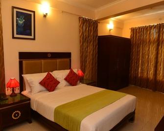 Trivandrum Hotel - 特里凡特浪/特里凡得琅 - 睡房