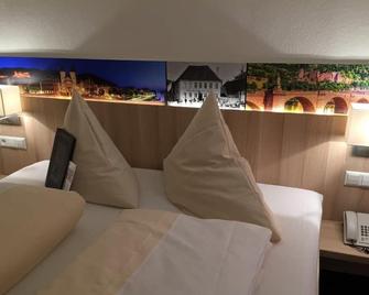 玫瑰酒店 - 海德堡 - 睡房