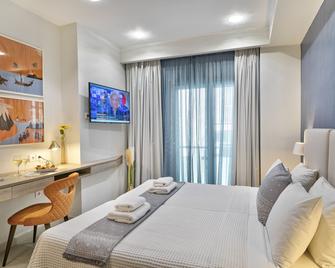 菲迪亚斯比雷埃弗斯酒店 - Piraeus - 睡房