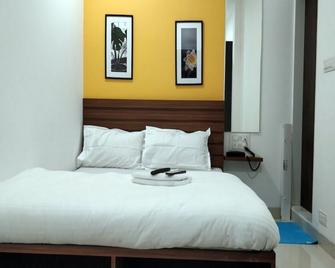 新夏哈纳酒店 - 孟买 - 睡房