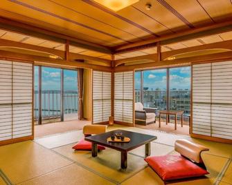 汤快度假村 New Maruya 酒店 - 加贺市 - 客厅