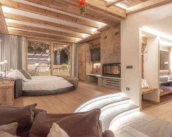 Le Chalet Suite Livigno - 利维尼奥 - 睡房