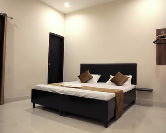 Aspire Rooms 712 - 卢迪亚纳 - 睡房