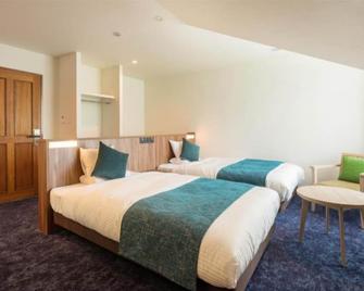 Renewal Premier Twin Room Nonsmoking / Semboku Akita - 仙北市 - 睡房