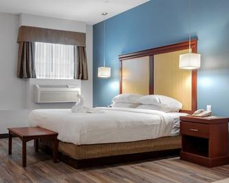 Premier Inn & Suites - Downtown Hamilton - 汉密尔顿 - 睡房