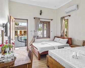 纳伊洋房酒店 - Phu Quoc - 睡房