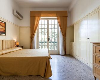 Hotel Club I Pini - 卡马约雷 - 睡房
