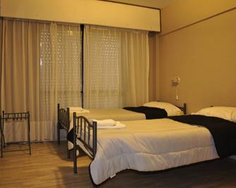 Rayentray Hostal - 玛德琳港 - 睡房