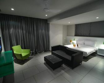 SinQ 派对酒店 - 坎多林 - 睡房