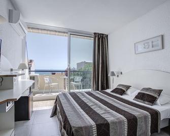 中央海滩酒店 - 滨海阿热莱斯 - 睡房