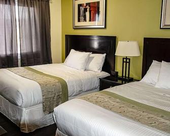 Skyland Motel Inn & Suites - 亨茨维尔 - 睡房