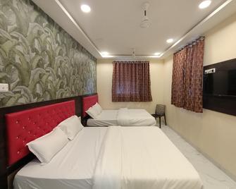 酒店王国驻地 - 孟买 - 睡房