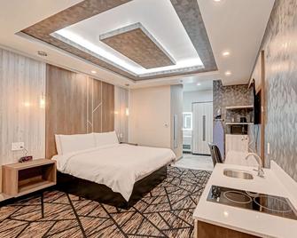 SureStay Hotel by Best Western Houston Southeast - 南休斯敦 - 睡房