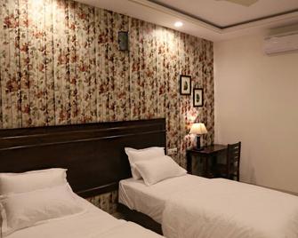 White Tulips Home Stay - 斋浦尔 - 睡房