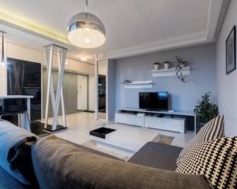 Karpia Deluxe Apartment - 波兹南 - 客厅