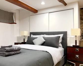 Stunning condo in an old grocery store - 魁北克市 - 睡房