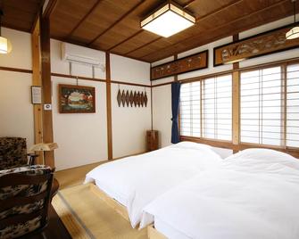 宿川之中的鱼旅馆 - 高山 - 睡房
