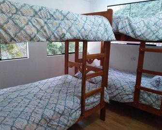 Hallasi Wasi Hostel - 马丘比丘 - 睡房