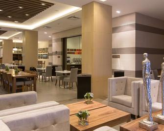 希尔顿埃莫西约汉普顿酒店 - 埃莫西约 - 餐厅