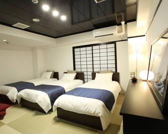 难波罗兹酒店 - 大阪 - 睡房