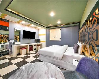 Gyeongju Rose Hotel Hwangni Dan-gil Branch - 庆州 - 睡房