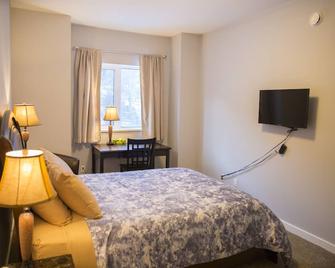 Downtown Whitehorse 4 bedrooms deluxe condo - 怀特霍斯 - 睡房