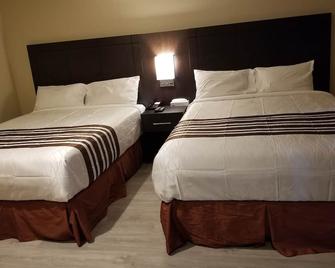 Silver Maple汽车旅馆 - 哈利伯顿 - 睡房