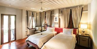 琅勃拉邦布拉莎丽传统酒店 - 琅勃拉邦 - 睡房