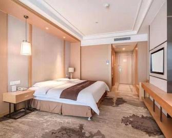 連雲港世紀緣國際酒店 - 连云港 - 睡房